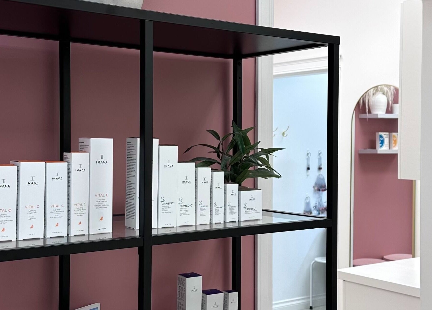 Pretty Hurts skincare display in Leduc, Alberta, CA, showcasing Image Vital C products on sleek shelves.