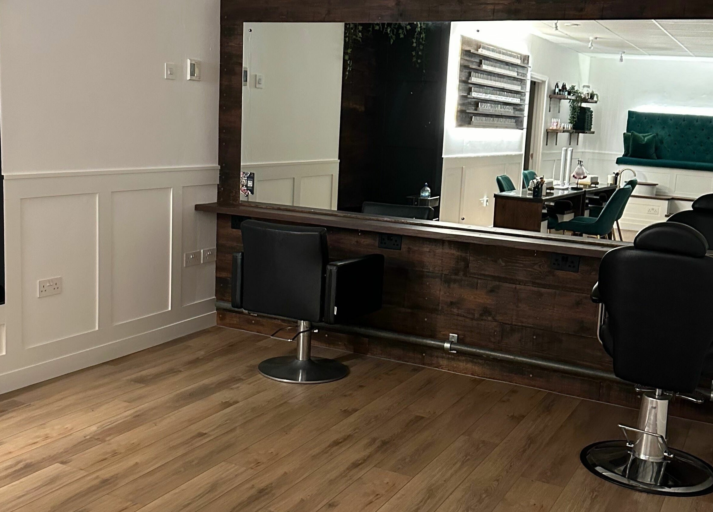 Modern salon interior at Taylor Cole in Truro, England, GB, showcasing stylish design and seating.