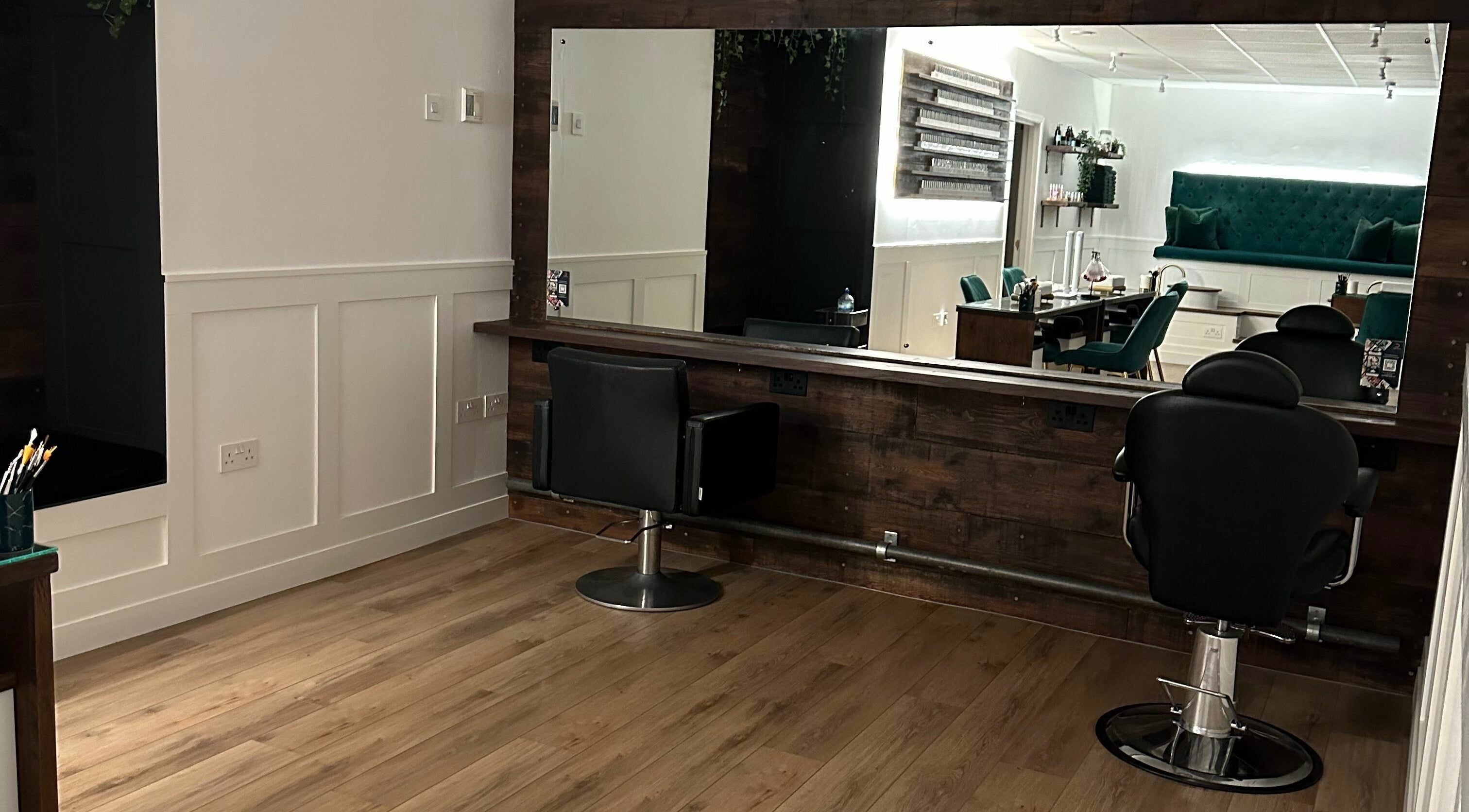 Modern salon interior at Taylor Cole in Truro, England, GB, showcasing stylish design and seating.