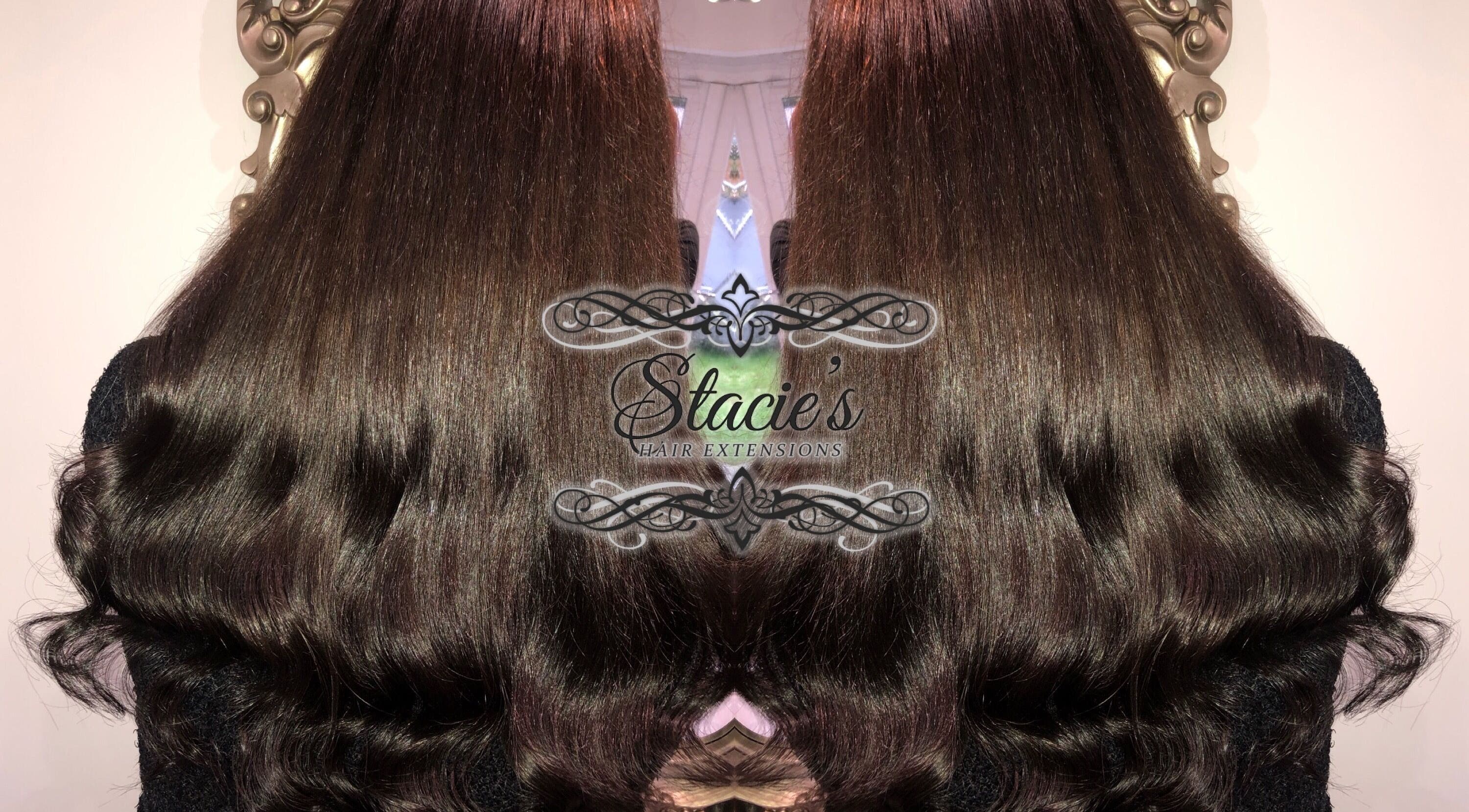 Sleek, long hair extensions at Stacies Hair Extensions, Bradford, England, GB, styled to glossy perfection.
