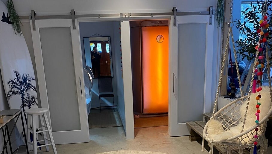 Relaxing space with swing chair and sun pod at Sparrow Beauty Co., Nelson, British Columbia, CA.