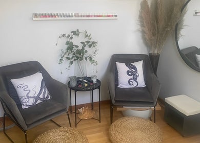 Chic waiting area with plush chairs at Sparrow Beauty Co., Nelson, British Columbia, CA.