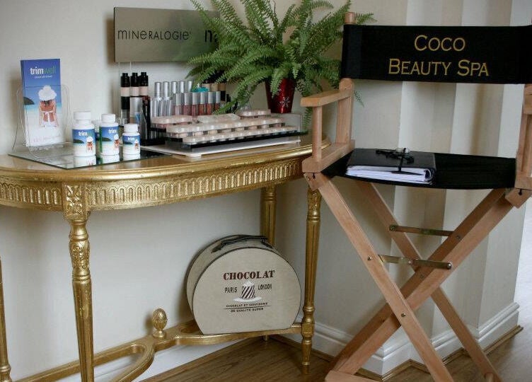 Coco Aesthetics & Beauty in Coal Aston, England showcases luxury chair and golden makeup station.