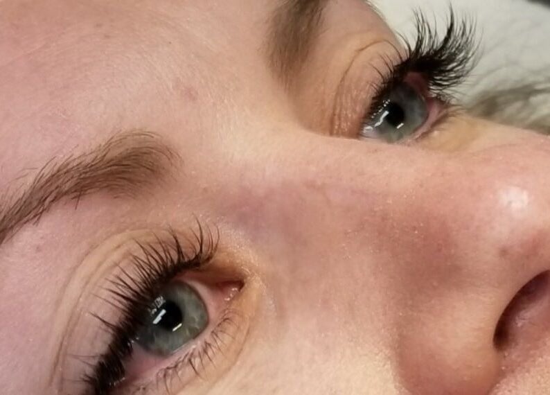 Close-up of elegant lash extensions at Symmetry Skin & Body in Greater Sudbury, Ontario, CA.