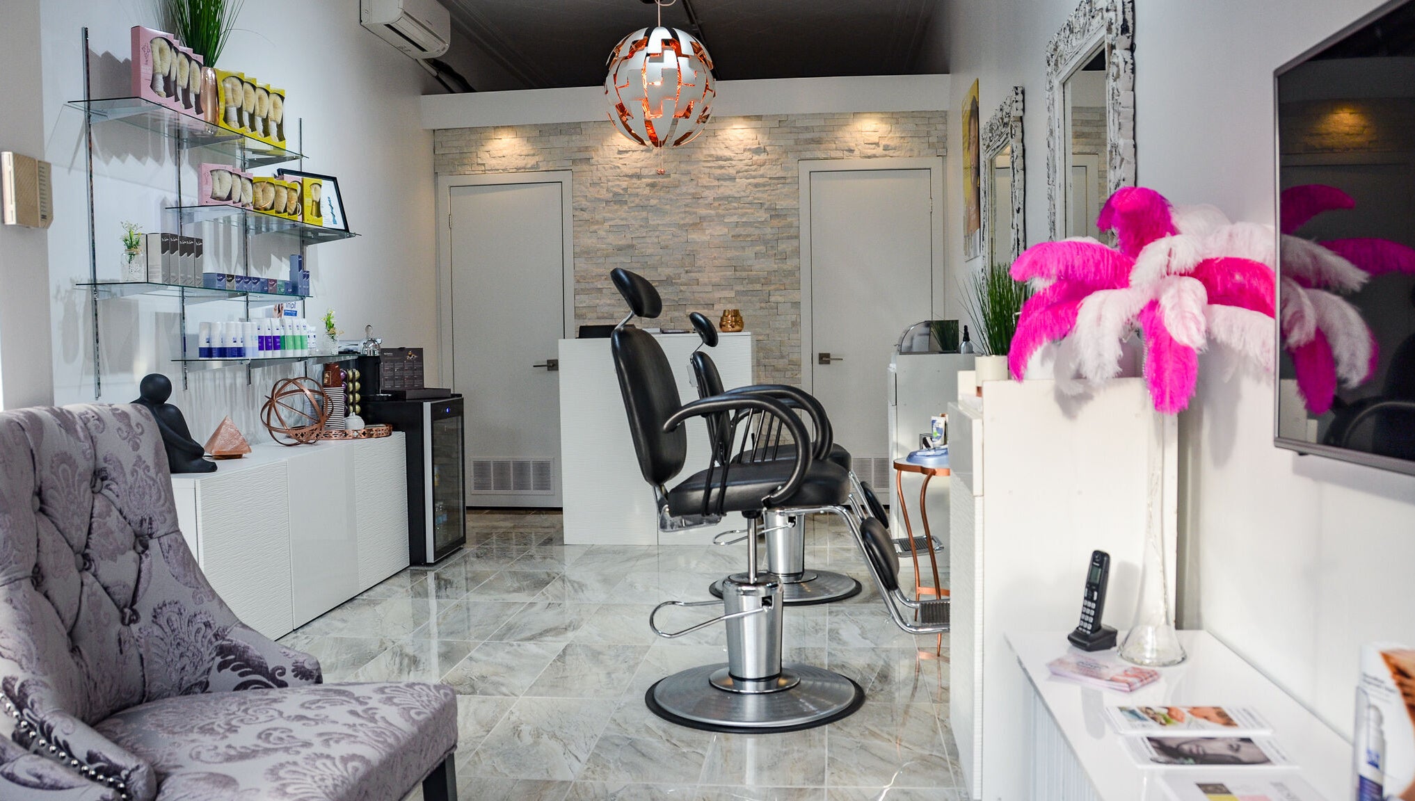 Modern interior of Jade Thread and Wax Bar - Bayview in Toronto, Ontario, CA, featuring elegant salon chairs and decor.