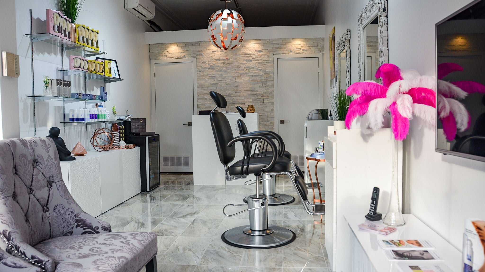 Modern interior of Jade Thread and Wax Bar - Bayview in Toronto, Ontario, CA, featuring elegant salon chairs and decor.