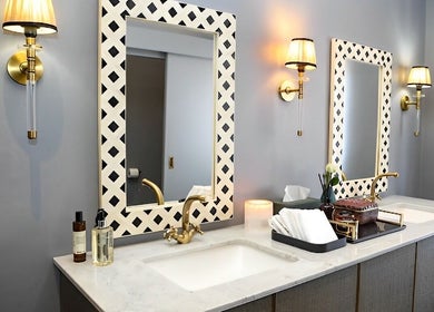 Stylish bathroom vanity at Body Beautiful Durban, Durban North, KwaZulu-Natal, ZA, featuring chic lighting.