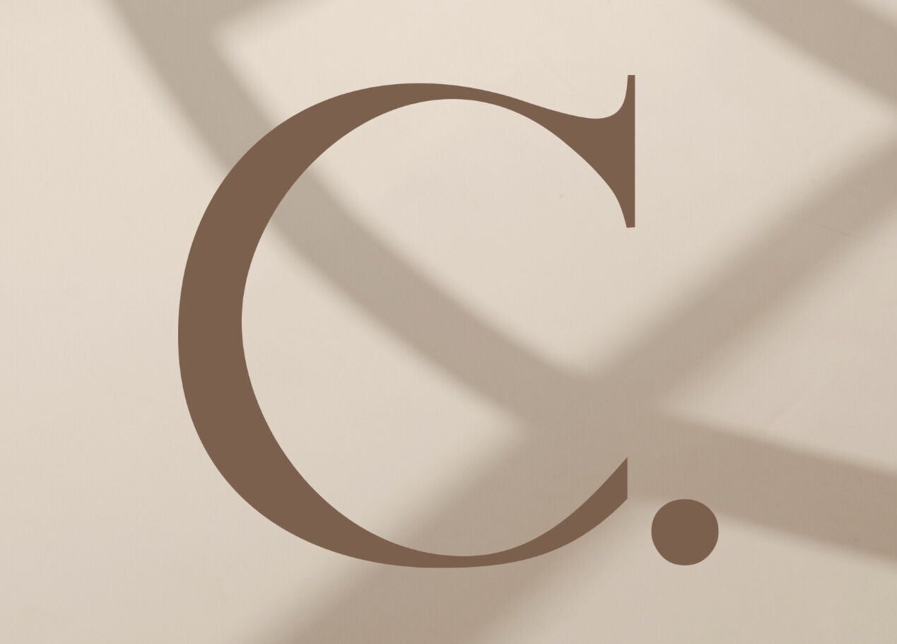 Stylish monogram C on textured background at Coveted Beauty by Kelly, Wroxham, England, GB.