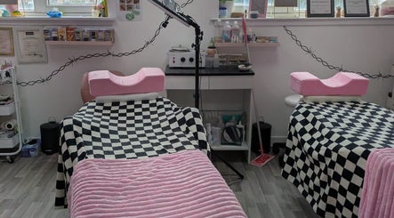 Beauty treatment room with pink accents at Blossom Beauty and Training Academy, Glasgow, Scotland, GB.