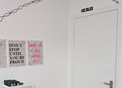 Motivational posters in Blossom Beauty and Training Academy, Glasgow, Scotland, GB, create a positive atmosphere.