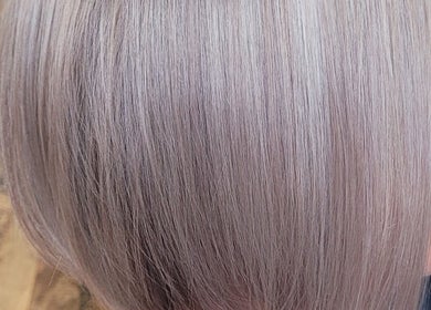 Chic blonde bob hairstyle at Studio B, Toronto, Ontario, CA, showcasing precision cut and color.