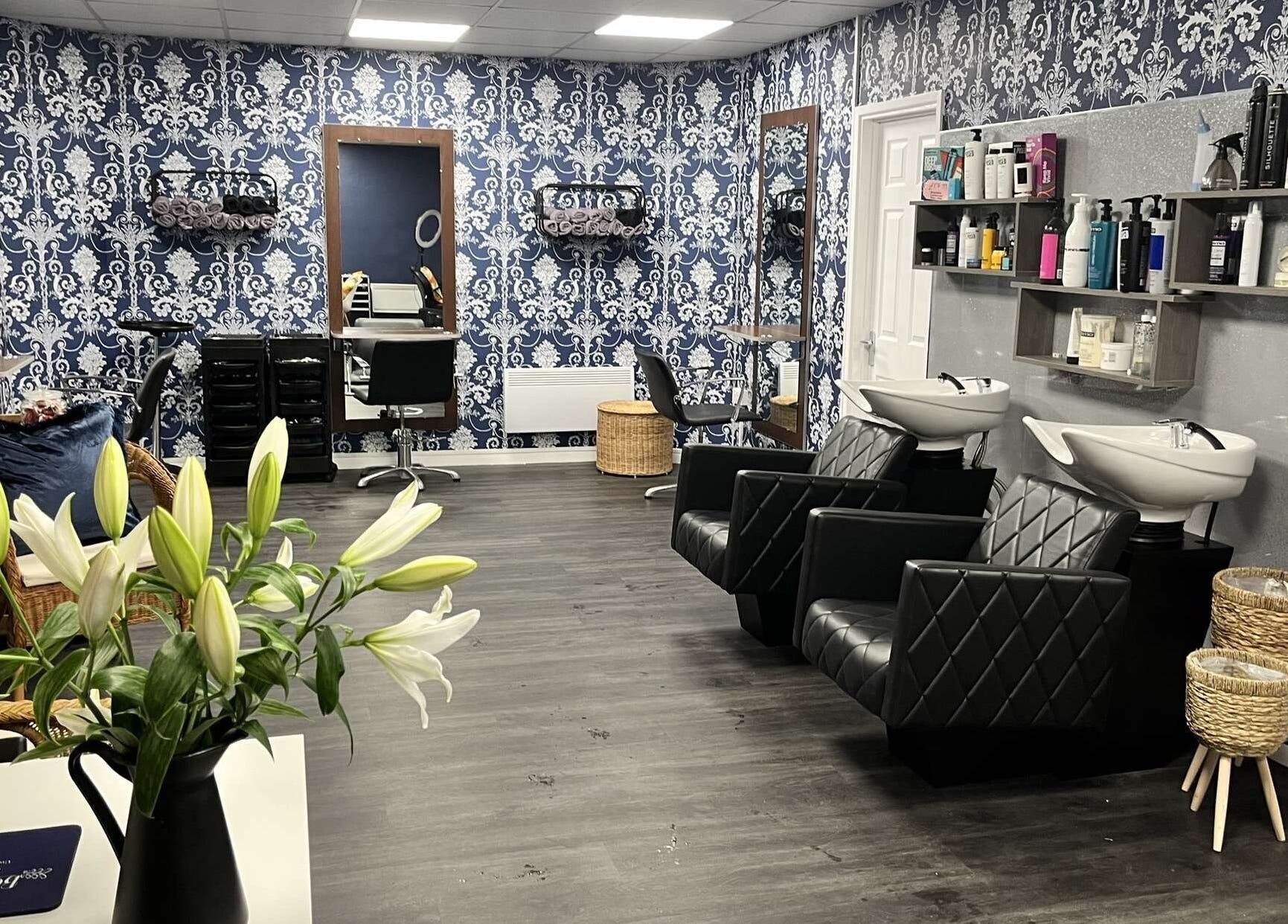 Interior of Bobby Bob's Salon & Barber Shop in Halstead, England, featuring stylish decor and modern salon chairs.