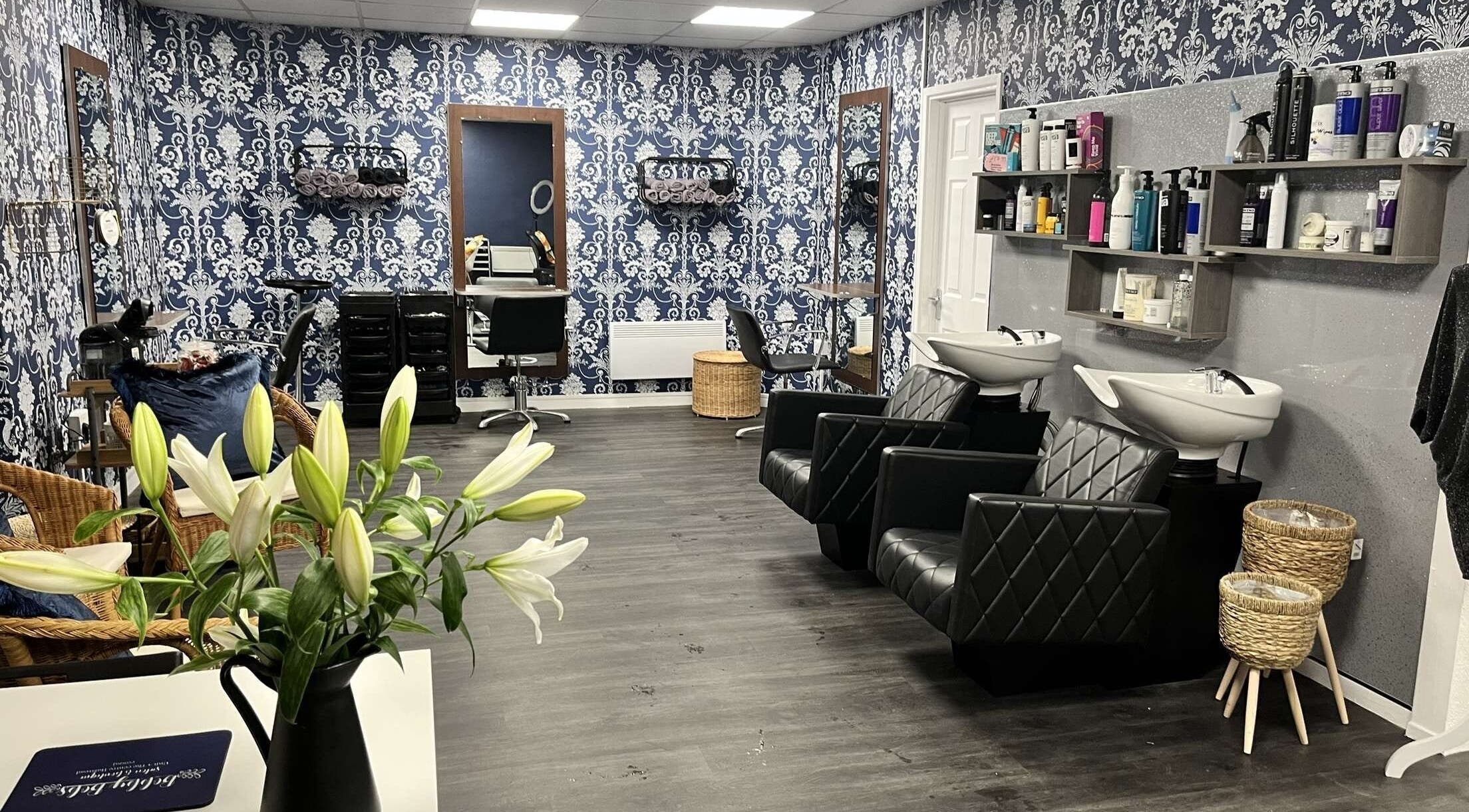 Interior of Bobby Bob's Salon & Barber Shop in Halstead, England, featuring stylish decor and modern salon chairs.