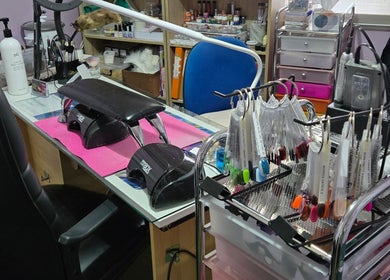 Sophisticated nail station at JNT Nails in Invercargill, Southland, NZ, showcasing tools and products.