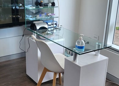 Modern glass-top beauty station at ABOUT FACE Beauty & Anti Aging Salon, Greenway, Australian Capital Territory, AU.