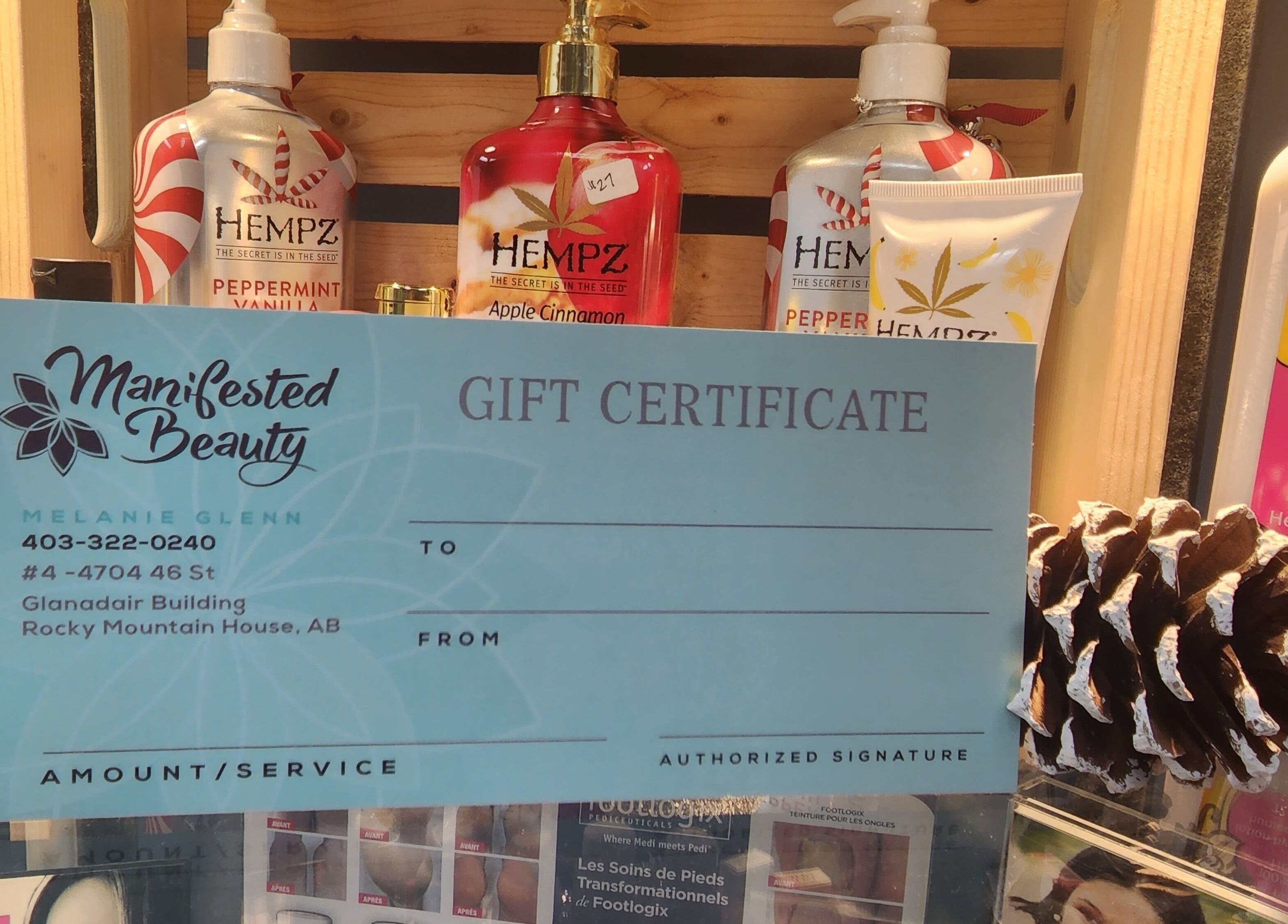 Gift certificate at Manifested Beauty, Rocky Mountain House, Alberta, CA displayed with hemp products.