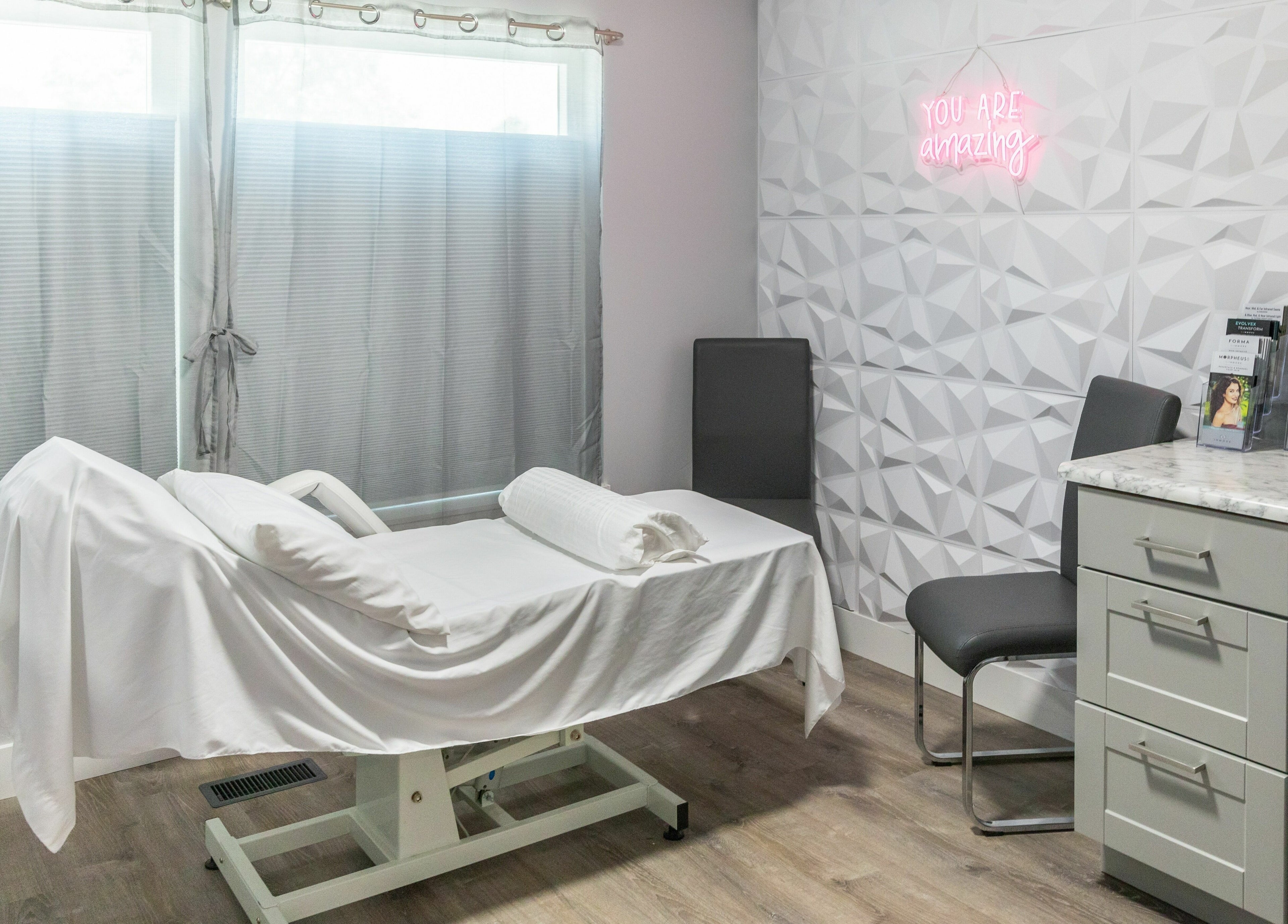 Relaxing wellness room at Health and Vitality, Orem, Utah, US, with a plush treatment table and calming decor.