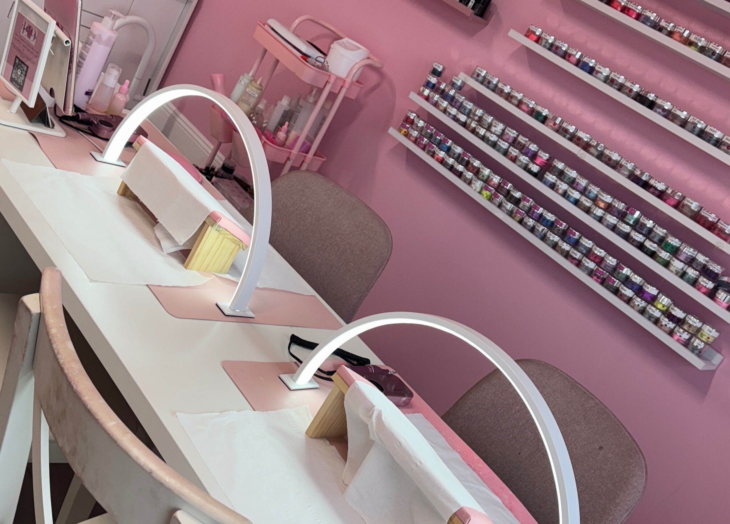 Stylish nail stations and polish display at Dazzling Diva Nails, Athenry, IE, showcasing vibrant colors.