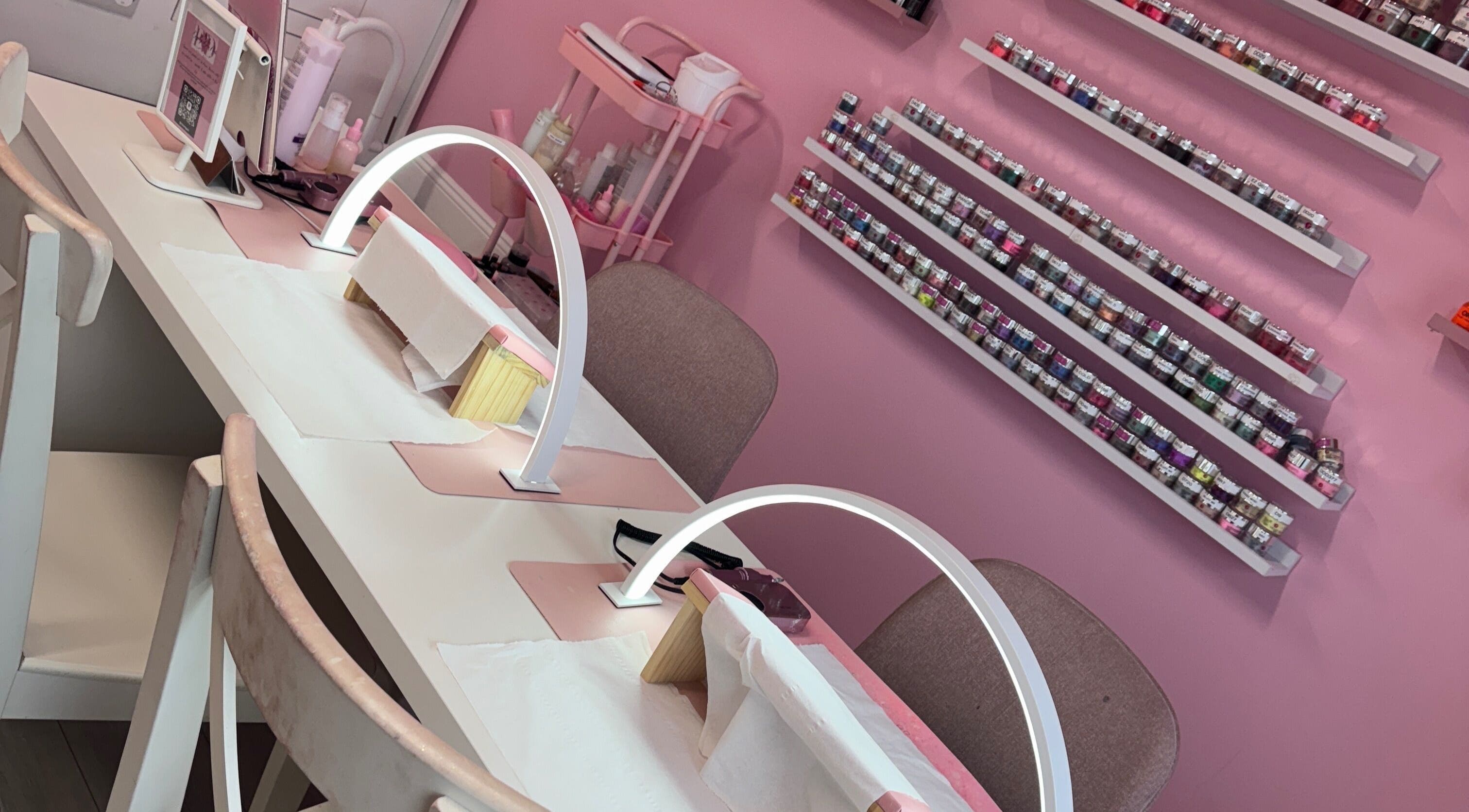 Stylish nail stations and polish display at Dazzling Diva Nails, Athenry, IE, showcasing vibrant colors.