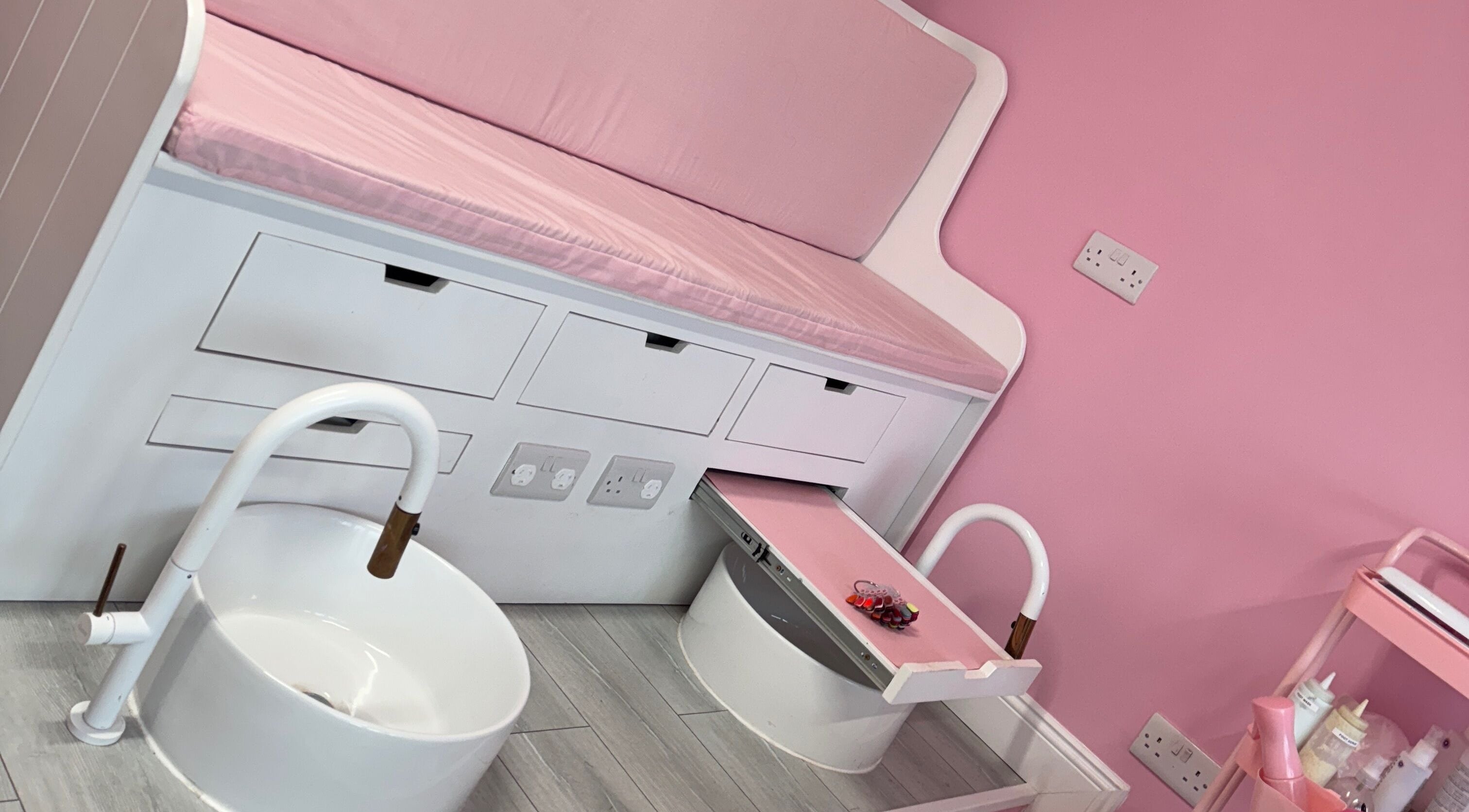 Elegant pink pedicure station at Dazzling Diva Nails in Athenry, IE, perfect for relaxing beauty treatments.