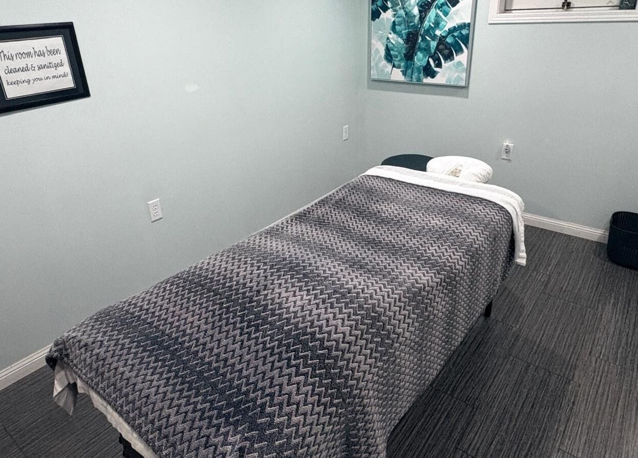 Comfortable massage room at Massage Therapy & Wellness Centre, Brampton, Ontario, CA, ready for relaxation.