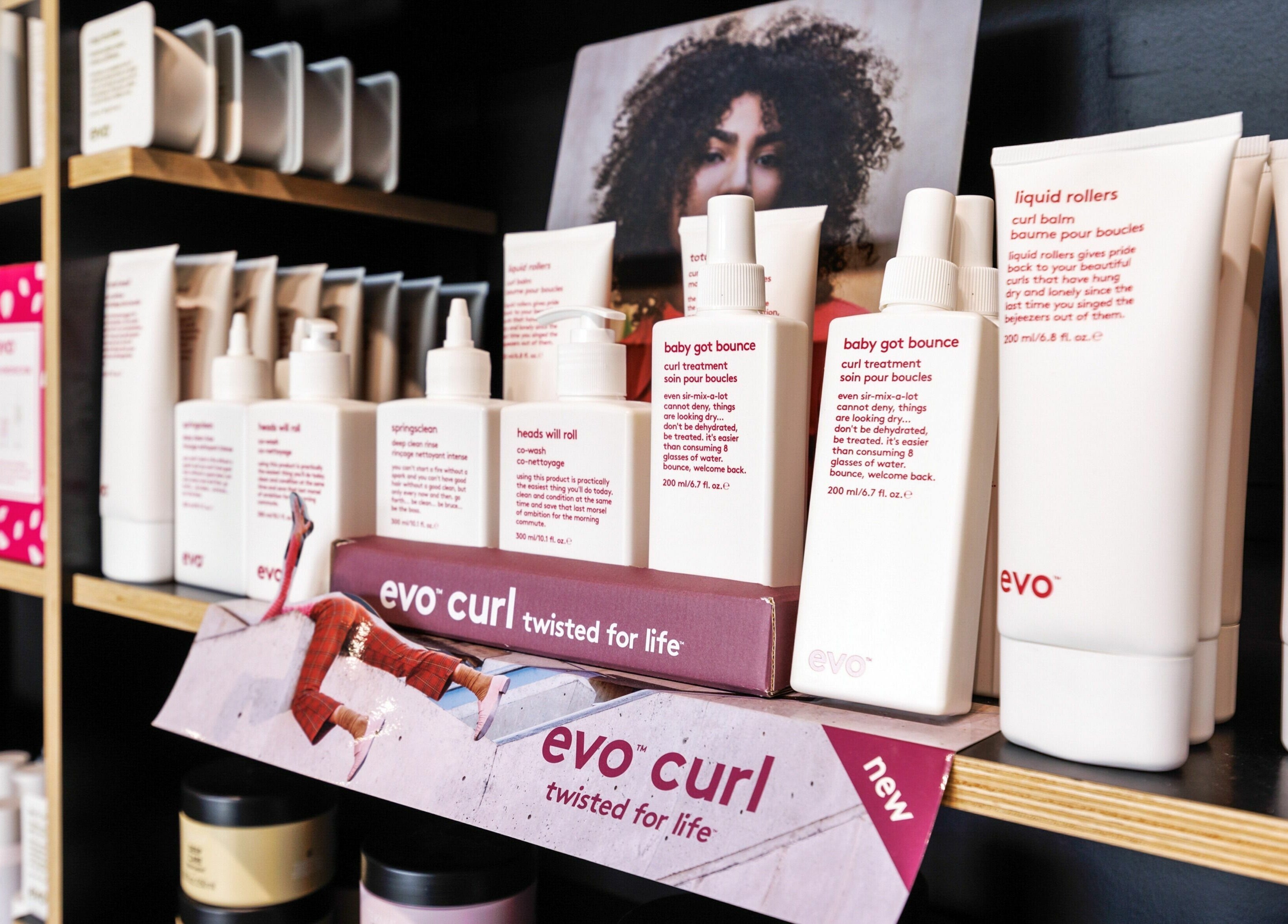 Evo hair products displayed at Lunatic Fringe, Clayfield, Queensland, AU, showcasing premium curl care.
