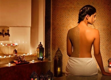 Relaxing ambiance at Naturelife Spa - Al Mairid in Ras Al-khaimah, Ras Al Khaimah, AE, featuring a candle-lit massage.