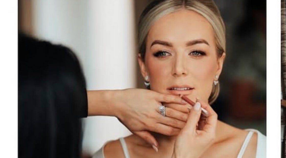 Makeup application at Rachael Hunter Makeup, East Kilbride, Scotland, GB. Lip enhancement in progress.