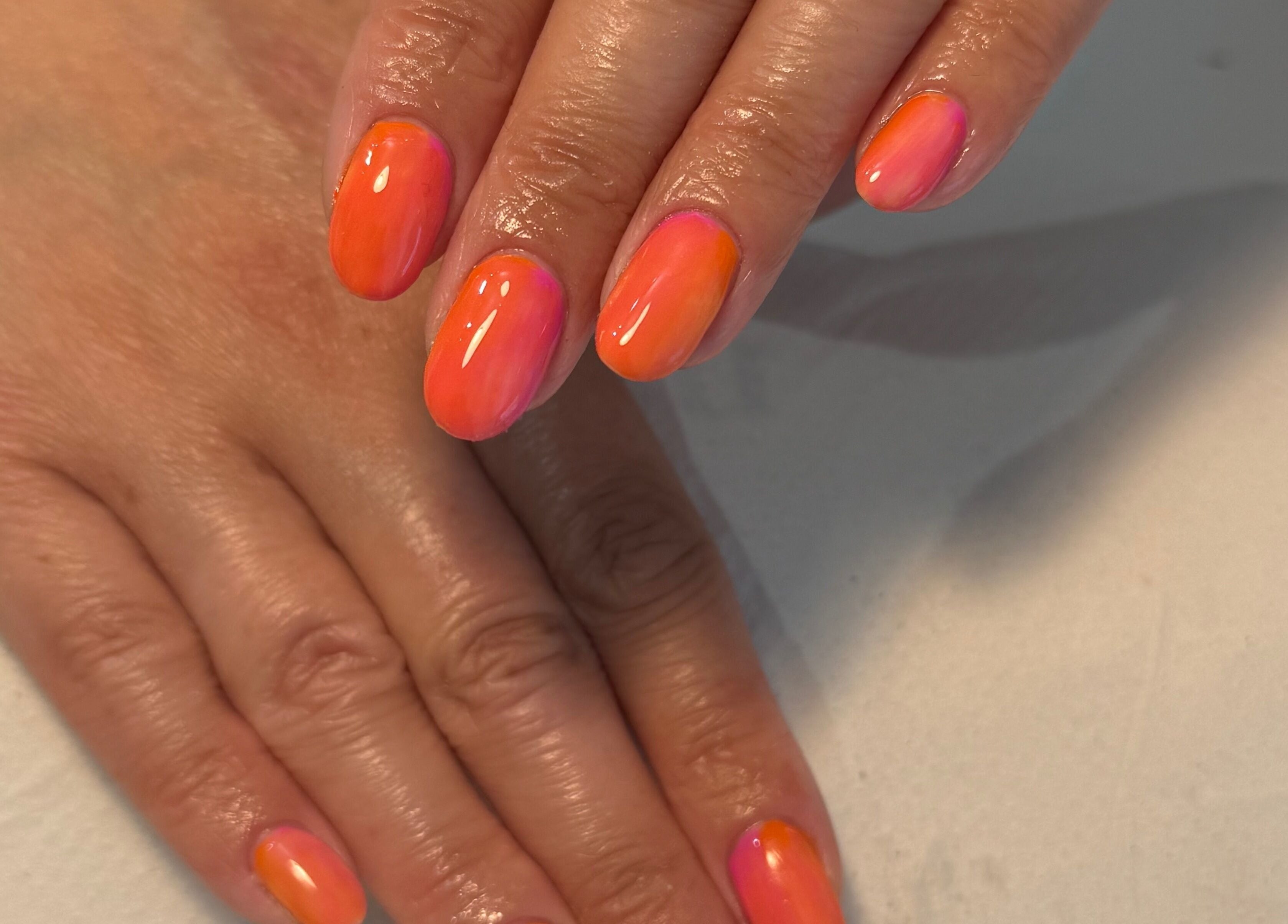 Orange and pink gradient nails at BC Beauty & Aesthetics in Kings Langley, England, GB.