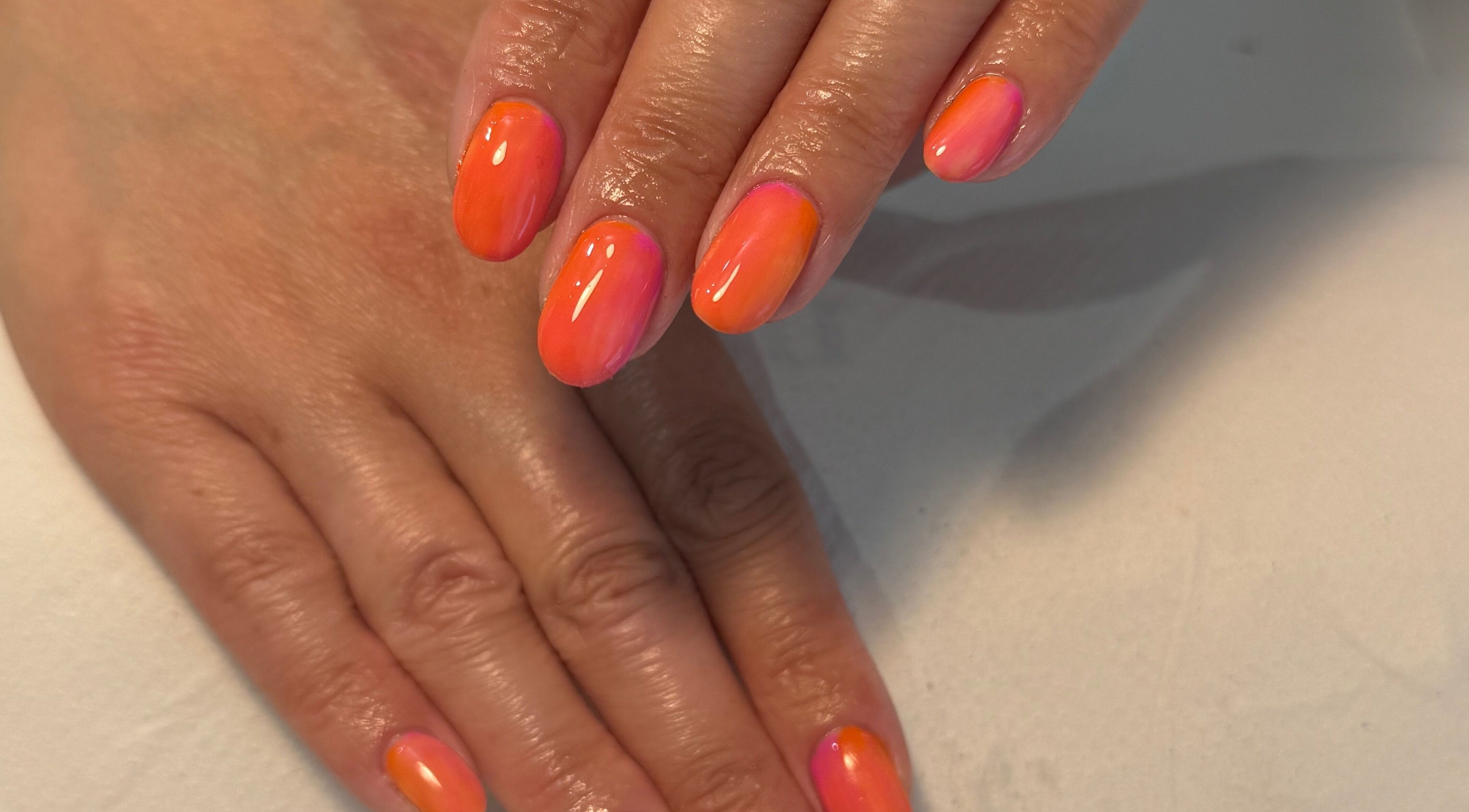 Orange and pink gradient nails at BC Beauty & Aesthetics in Kings Langley, England, GB.