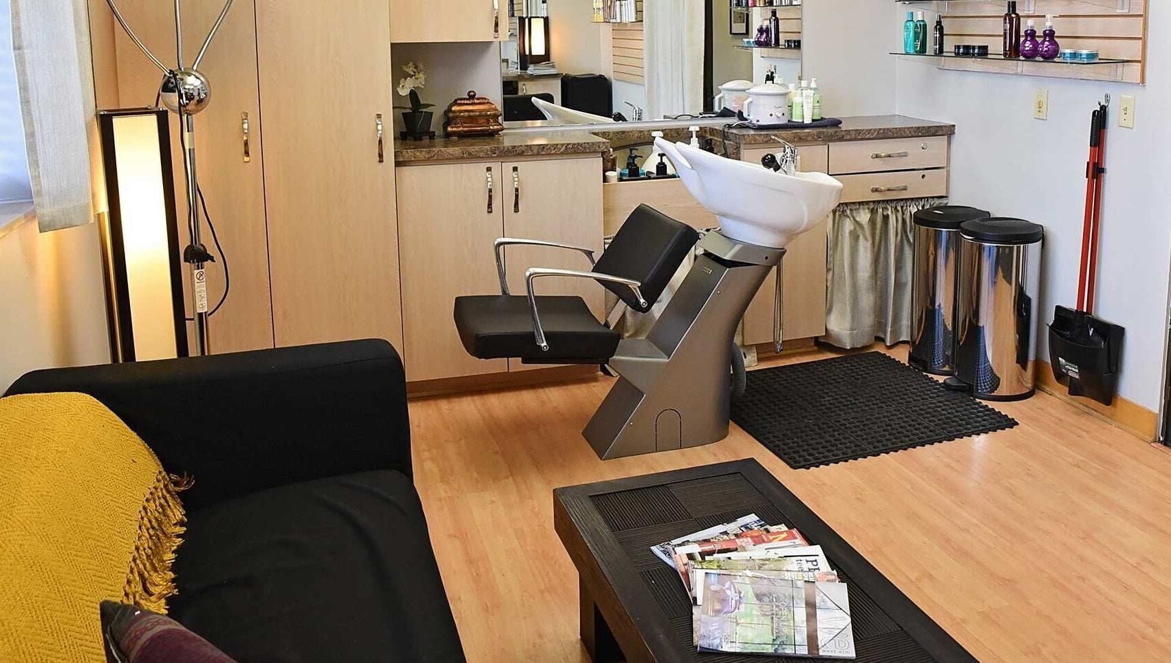 Modern hair salon at A.L. Studios, Madison, Wisconsin, US featuring sleek design and comfortable seating.