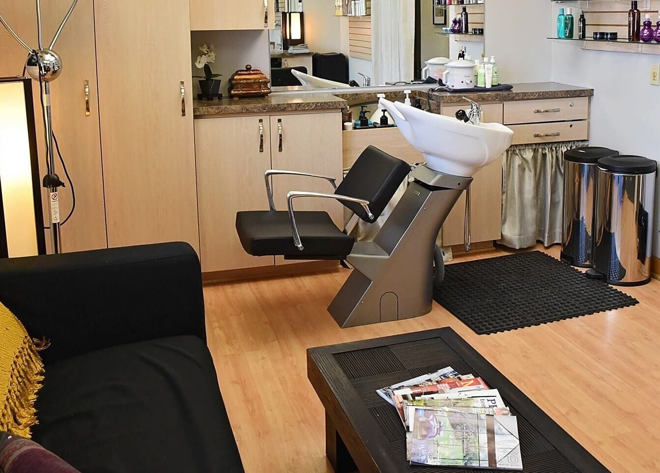 Modern hair salon at A.L. Studios, Madison, Wisconsin, US featuring sleek design and comfortable seating.