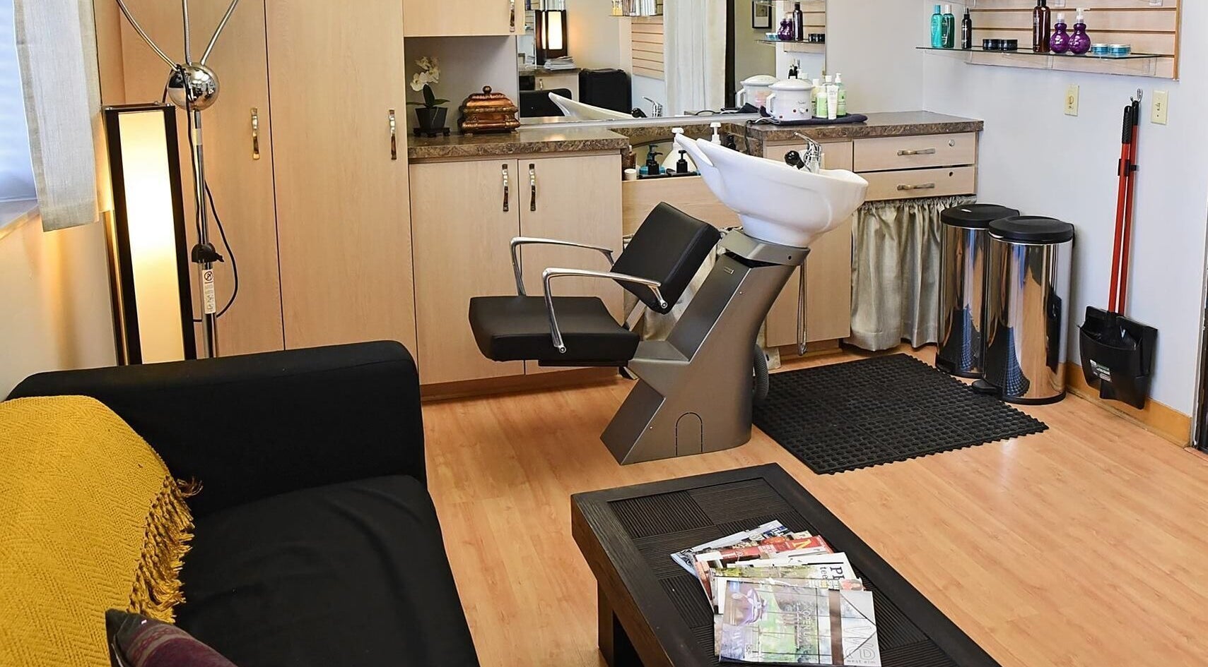 Modern hair salon at A.L. Studios, Madison, Wisconsin, US featuring sleek design and comfortable seating.