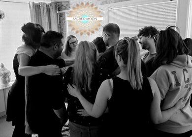 A group embraces at Sacred Moon Wellbeing & Quantum Led Coaching Academy, Horbury, England, GB.