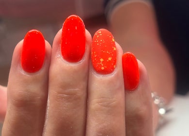 Bright red nail art at Boxmoor Beauty Room, Hemel Hempstead, England, GB showcasing vibrant style.