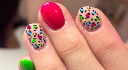 Colorful nail art design on nails at Boxmoor Beauty Room, Hemel Hempstead, England, GB.