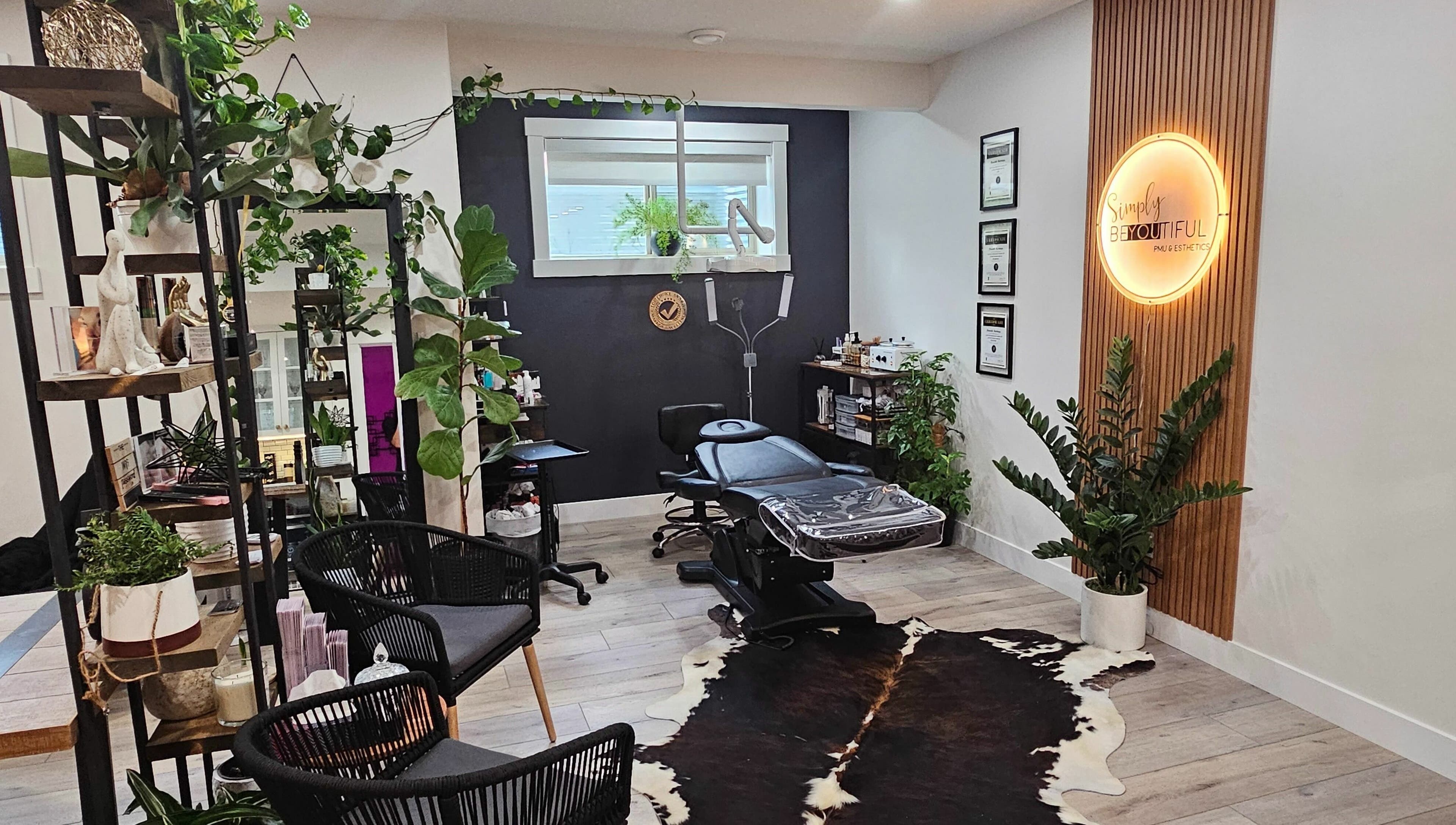 Modern interior with lush plants at Simply BeYoutiful PMU, St. Albert, Alberta, CA.