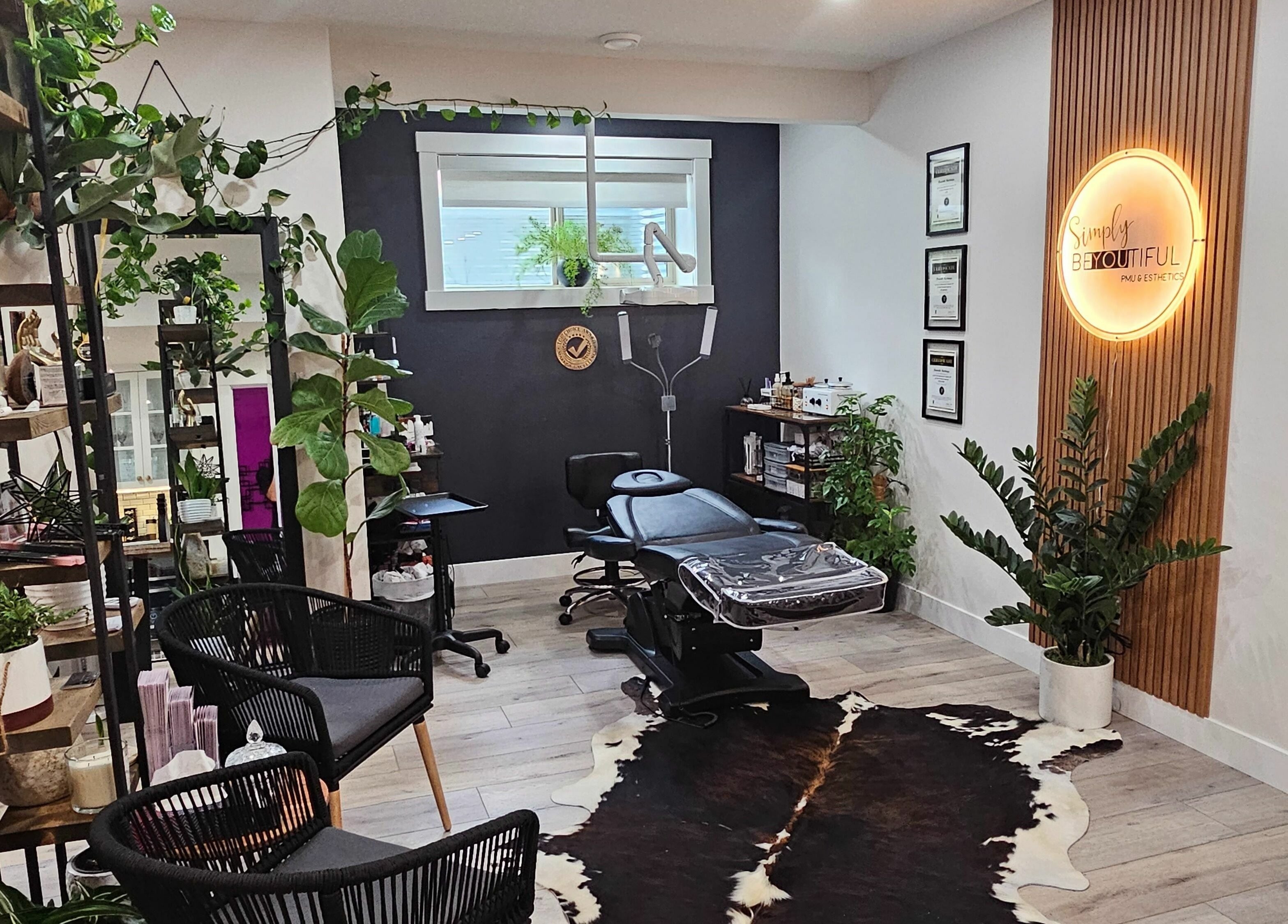 Modern interior with lush plants at Simply BeYoutiful PMU, St. Albert, Alberta, CA.