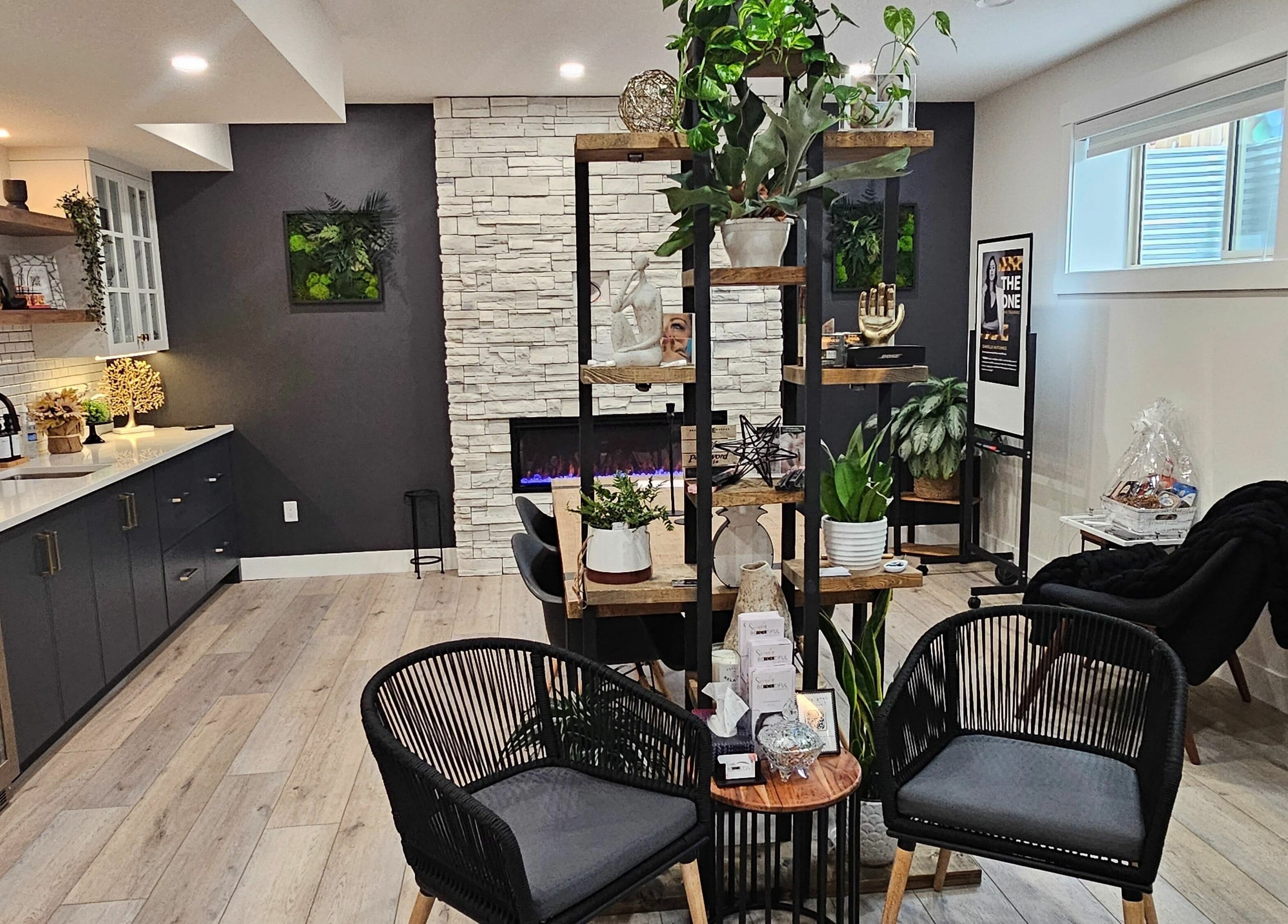 Cozy lounge in Simply BeYoutiful PMU, St. Albert, Alberta, CA, showcasing modern decor and seating area.