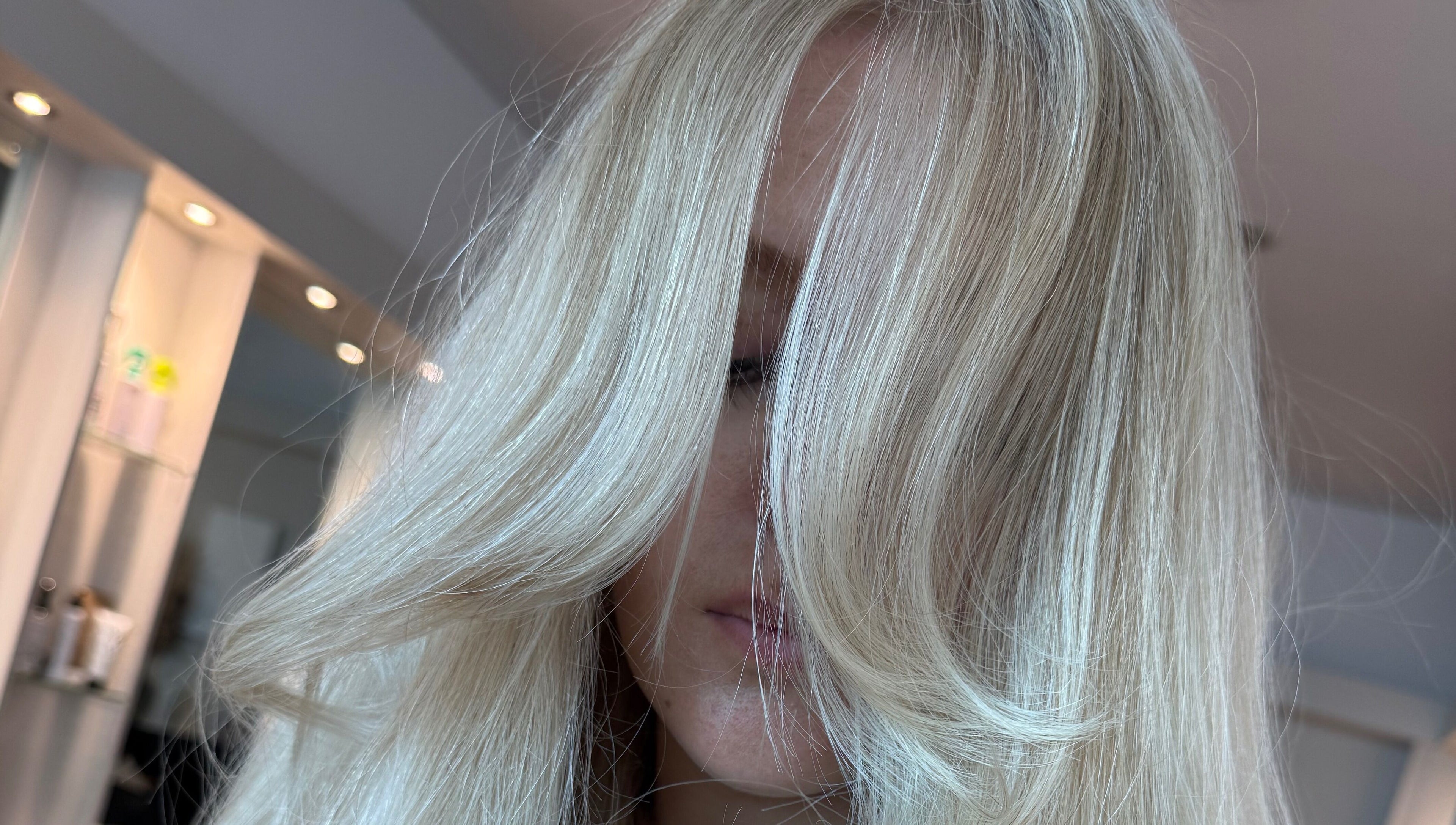 Blonde hair transformation at Ashleigh Hubbard Hair, Peterborough, England, GB showcasing silky smooth style.