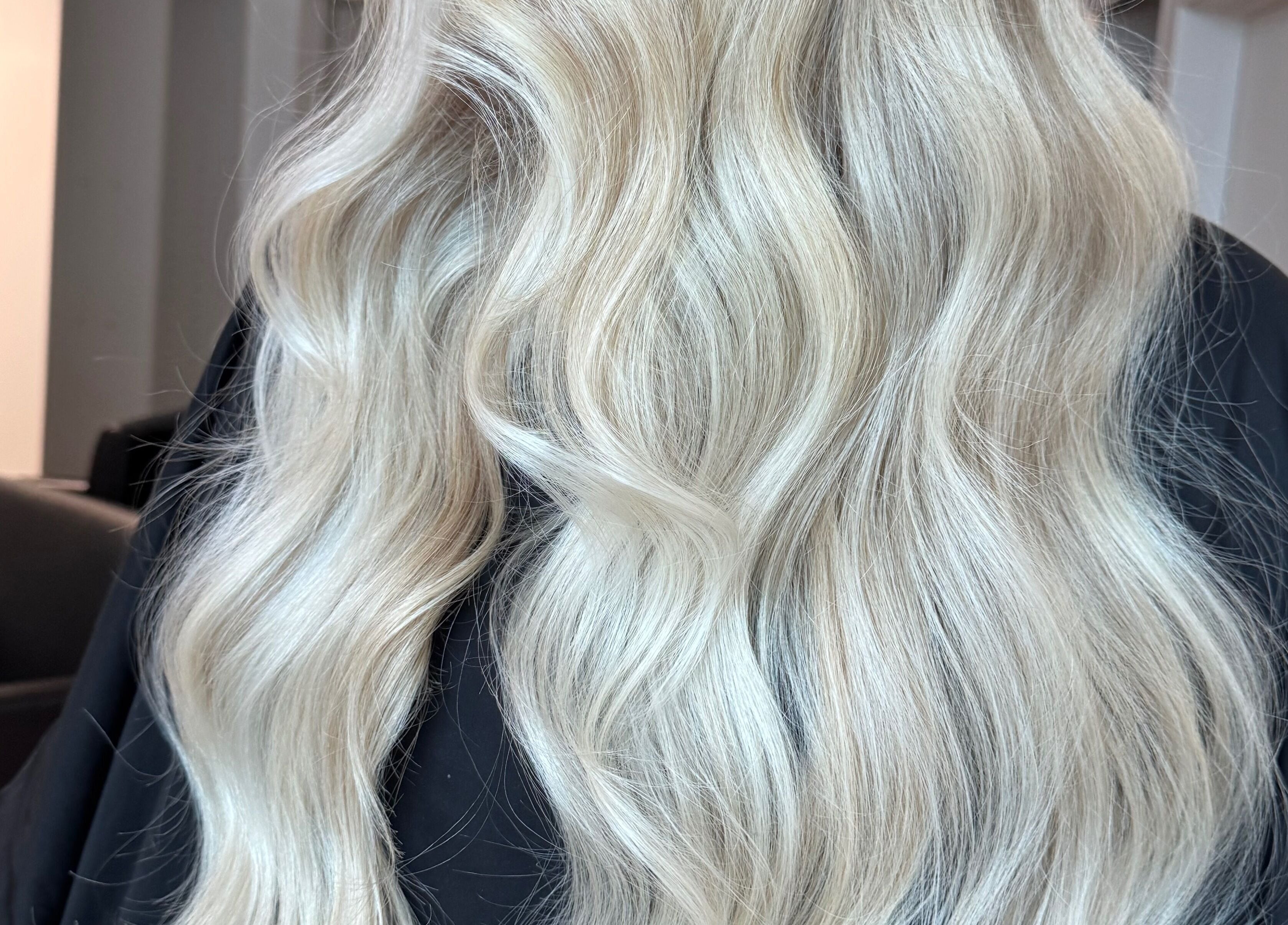 Stunning blonde waves styled at Ashleigh Hubbard Hair in Peterborough, England, GB.