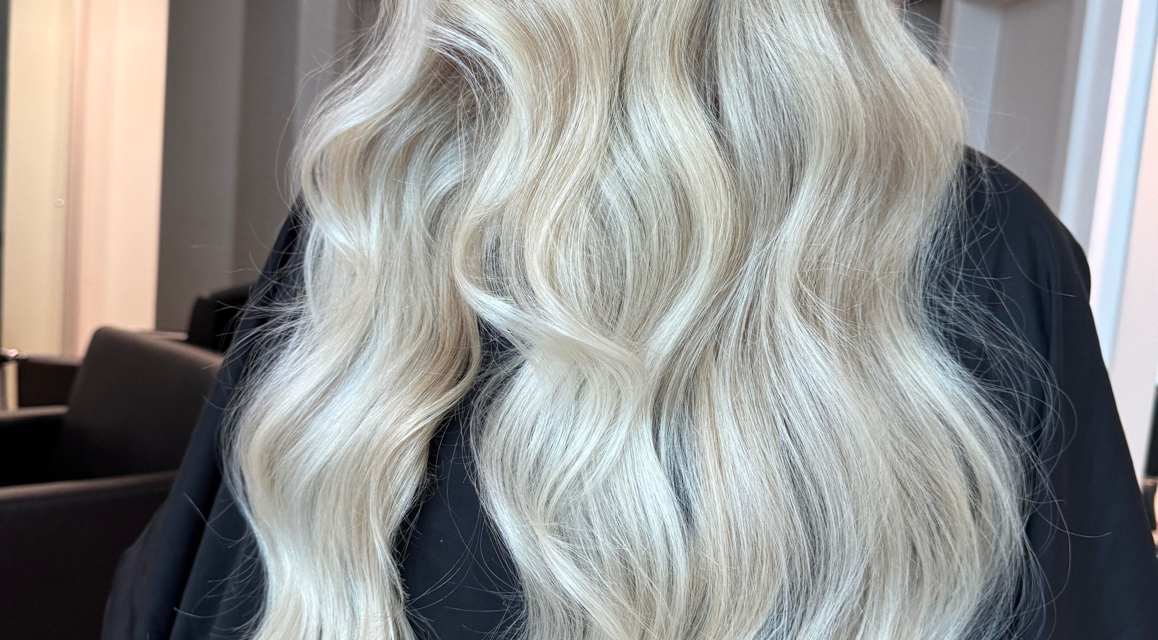 Stunning blonde waves styled at Ashleigh Hubbard Hair in Peterborough, England, GB.