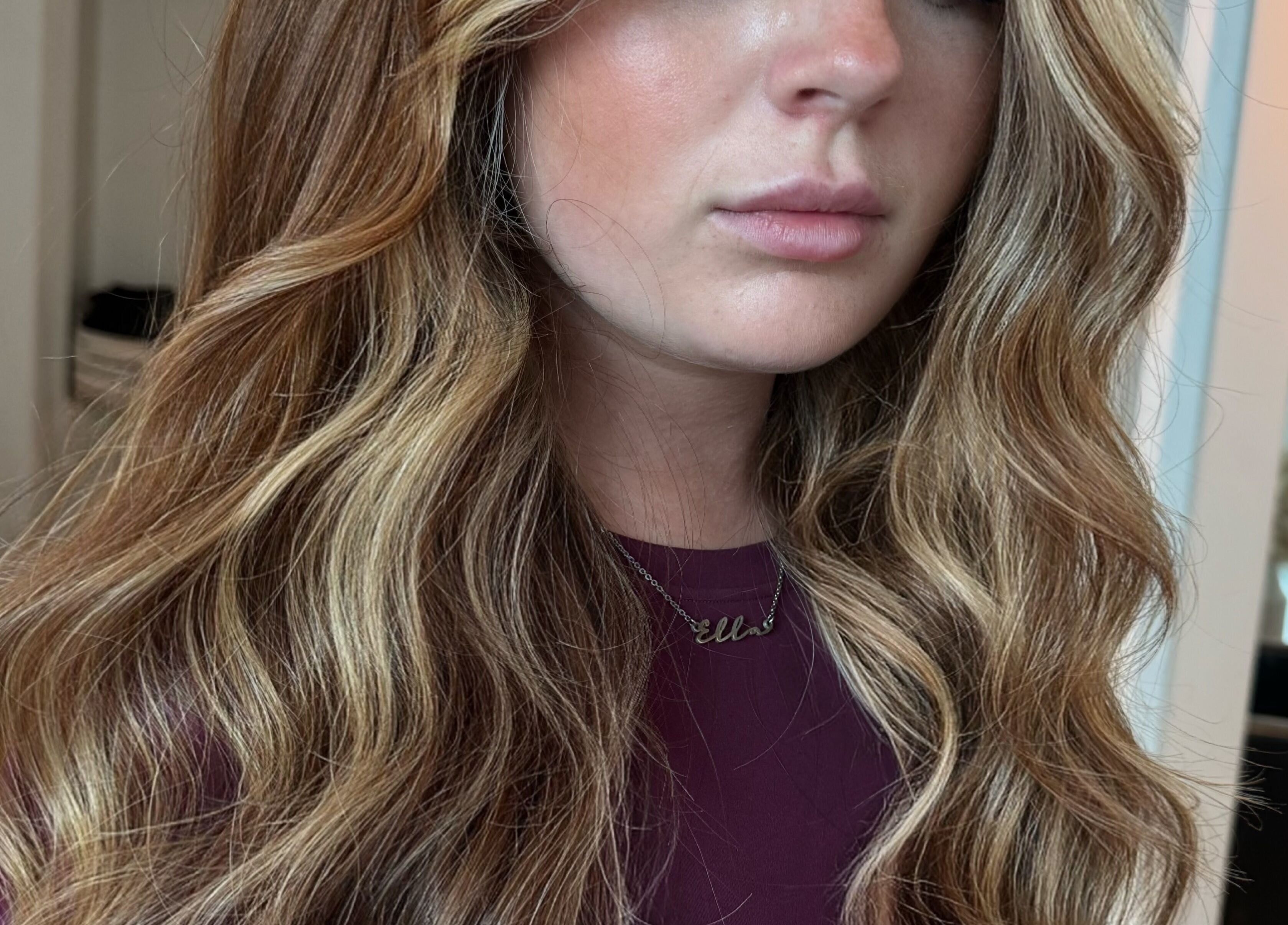 Elegant wavy hairstyle by Ashleigh Hubbard Hair in Peterborough, England, GB.