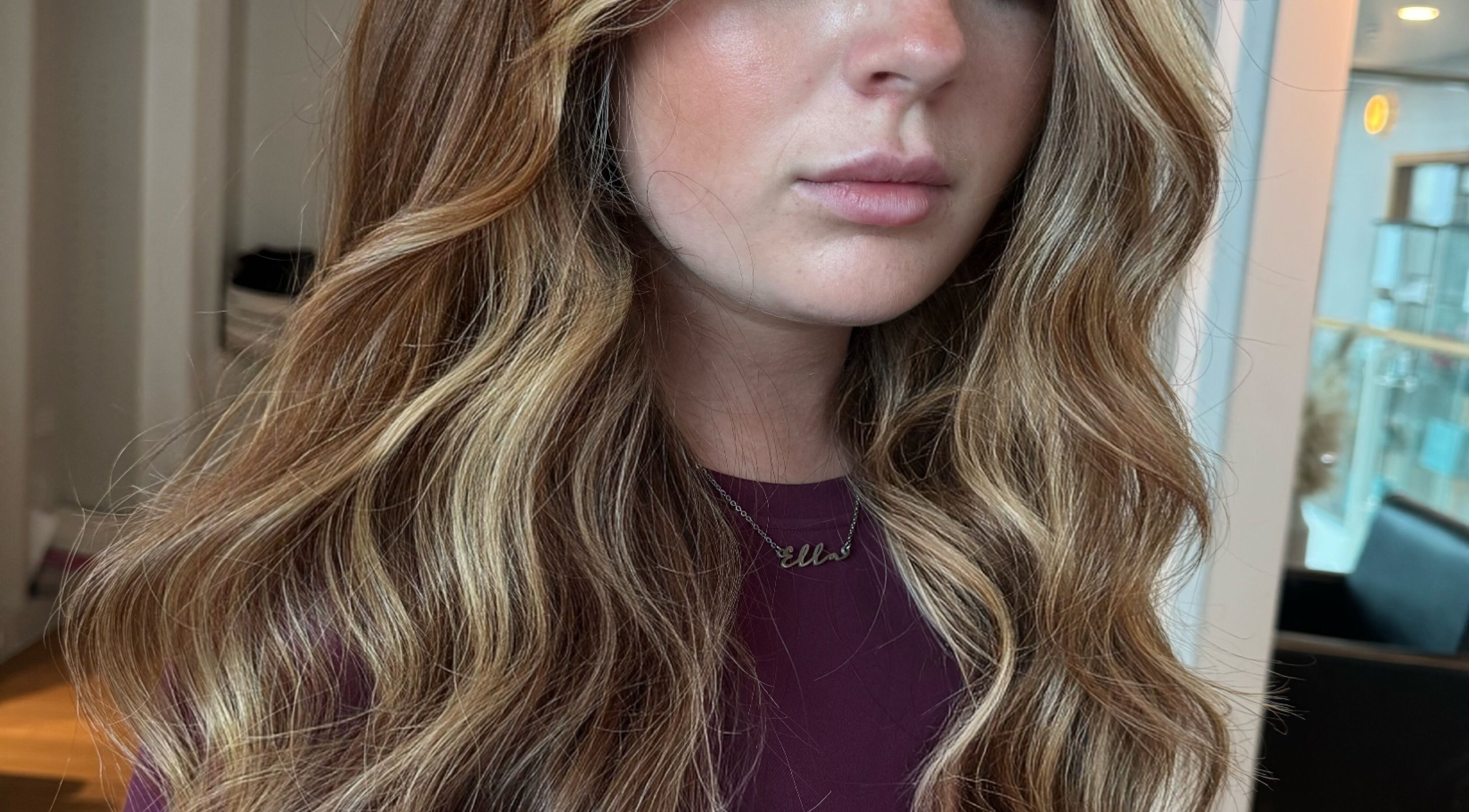 Elegant wavy hairstyle by Ashleigh Hubbard Hair in Peterborough, England, GB.