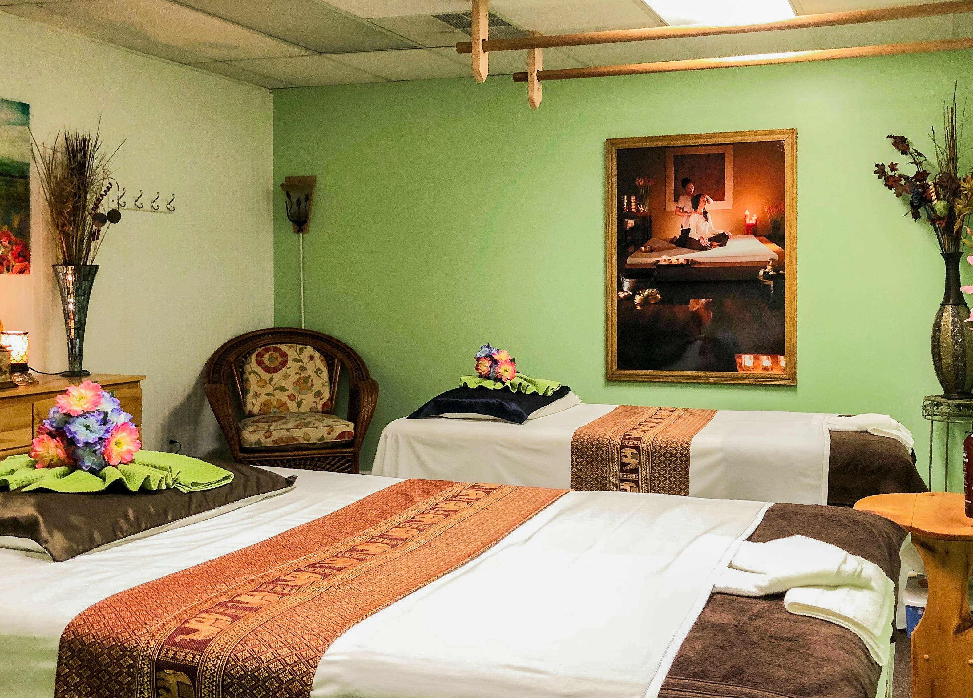 Relaxing massage room at Jamjuree Massage, Clovis, California, US, with calming decor and comfortable treatment beds.