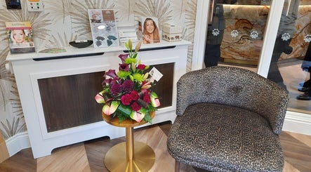 Elegant decor with floral arrangement at Karismha Health & Beauty Salon, Hatch End, Pinner, England, GB.