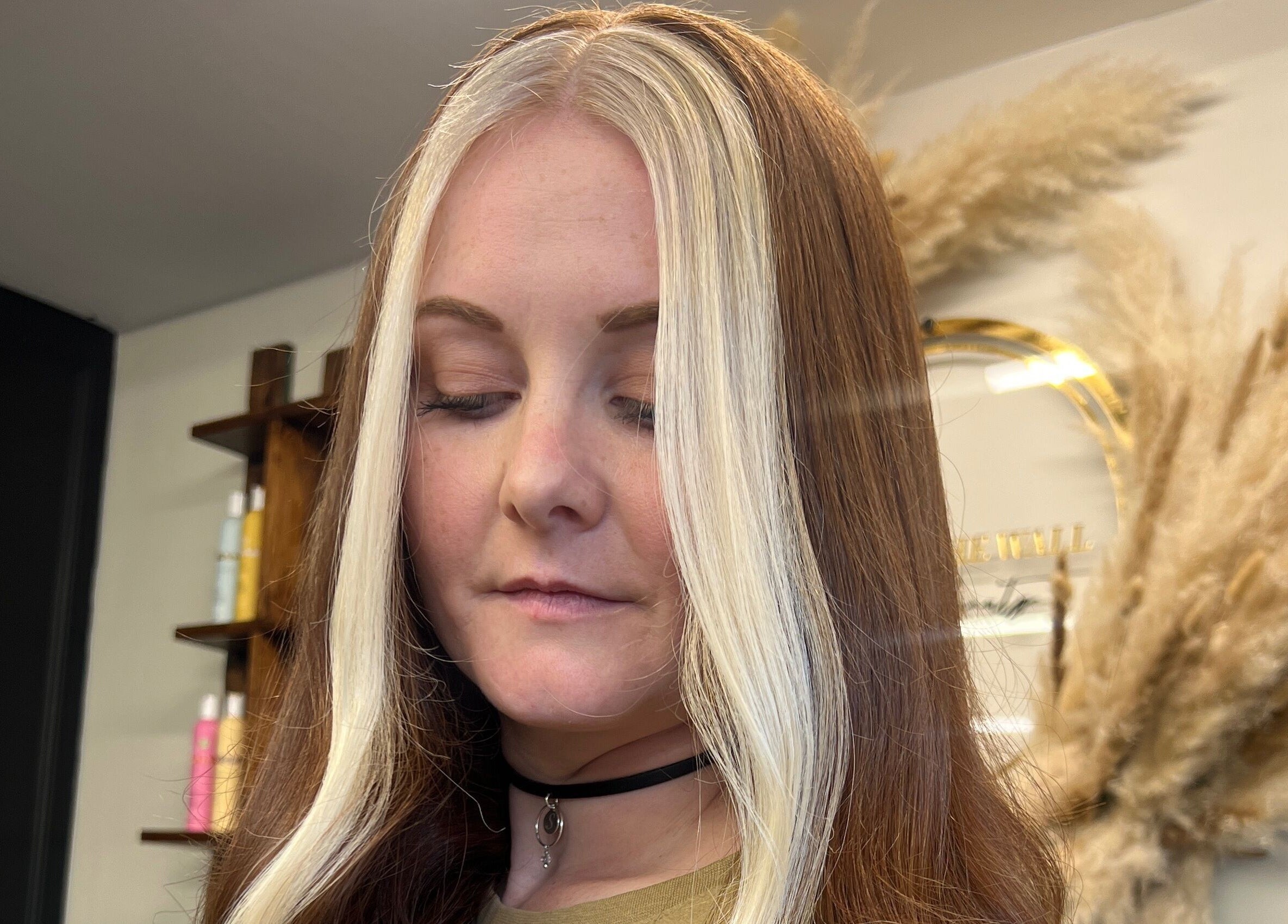 Sophisticated hairstyle at Mirror on the Wall salon in Stalham, England, GB.