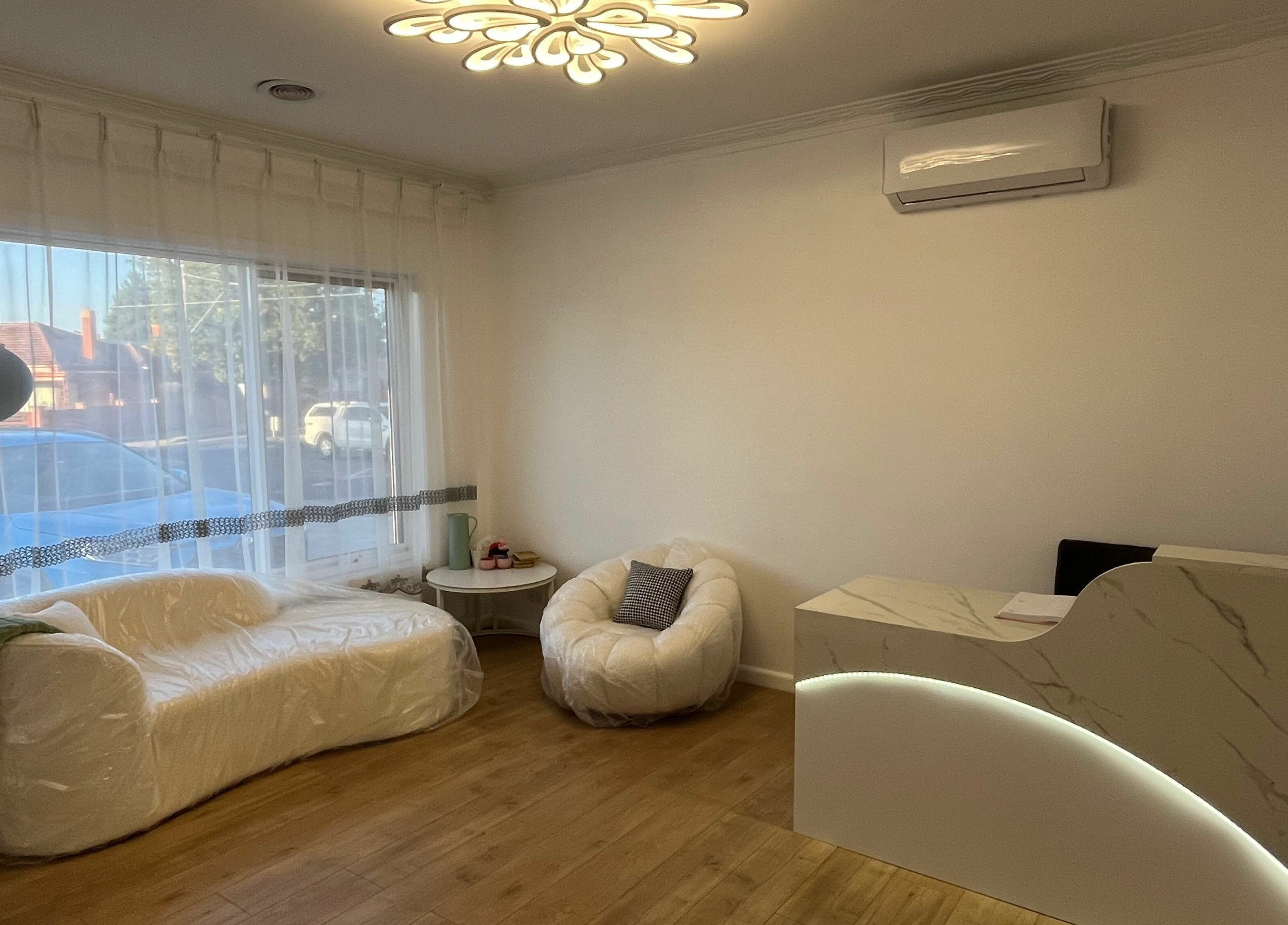 Elegant reception area at RTC Golden Point, Golden Point, Victoria, AU with cozy seating and soft lighting.