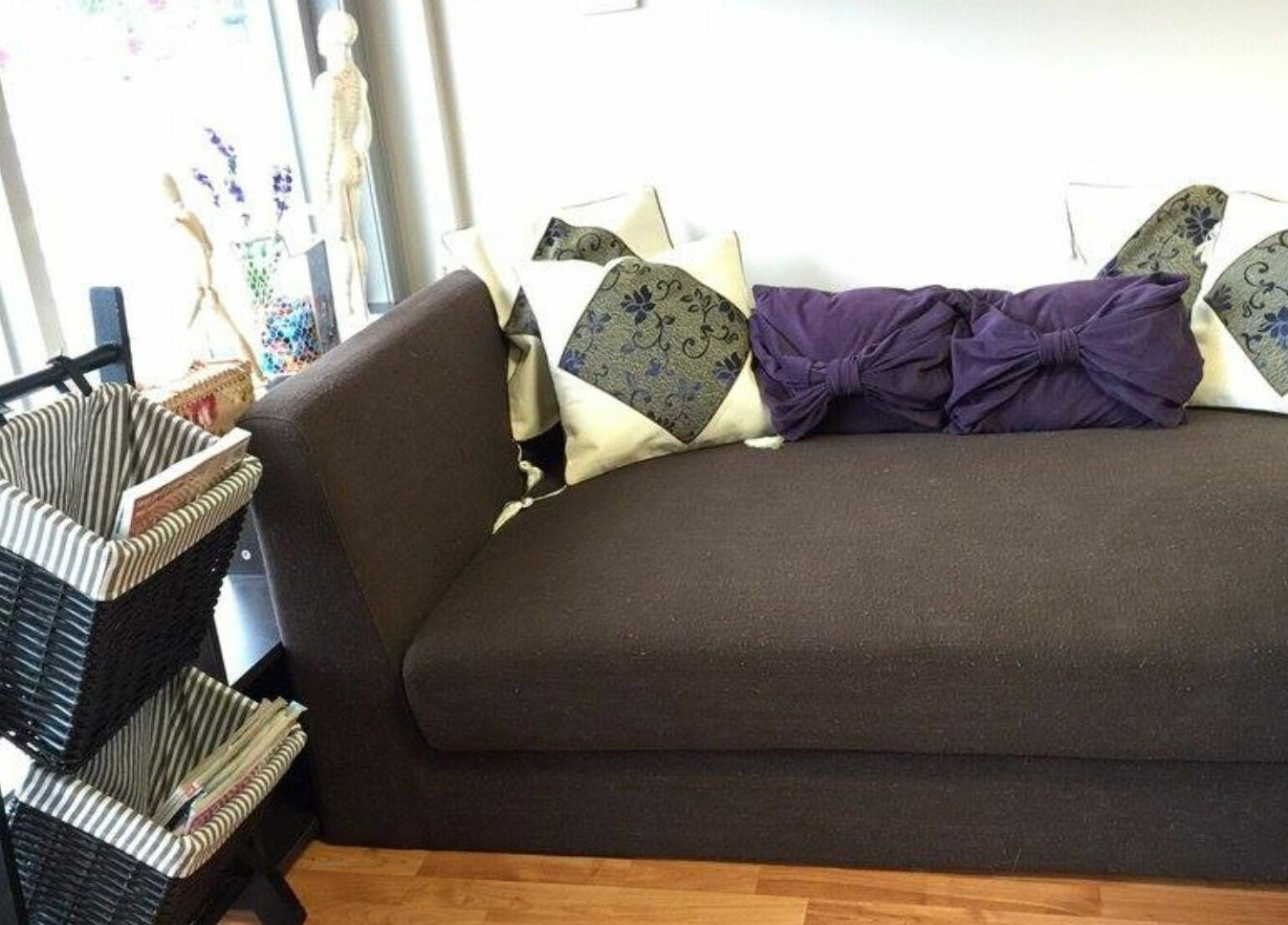 Cozy lounge area at RTC Golden Point, Golden Point, Victoria, AU with stylish cushions and basket decor.