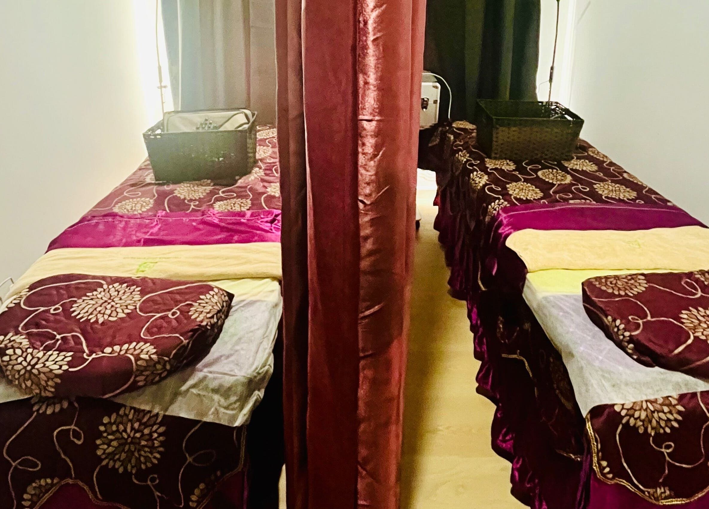 Luxury massage beds at RTC Wendouree Branch, Wendouree, Victoria, AU, with elegant floral satin covers.